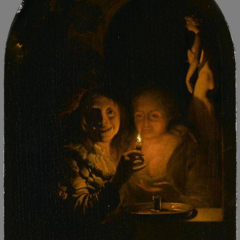 A loving couple lit by a candle. Light effect
