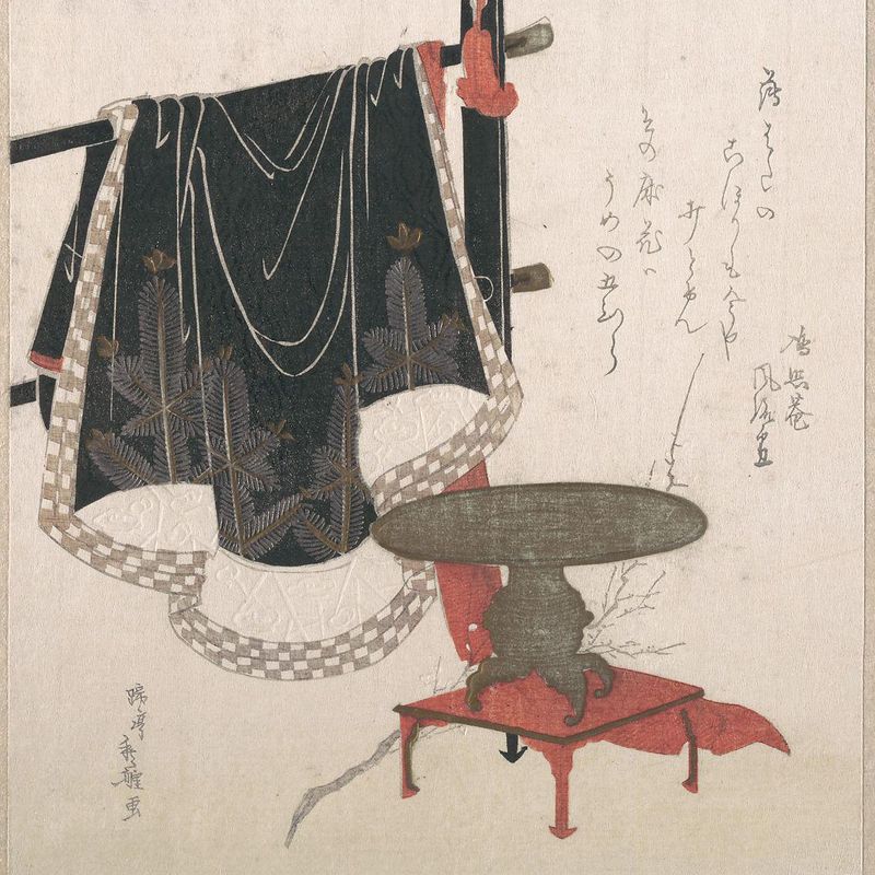 Flower Vase with Stand; Dress Hanging on a Clothesrack
