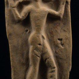 Relief Votive Plaque Showing A Naked Male Figure