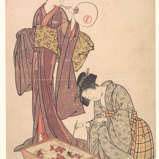 Two Women Feeding Fish