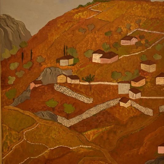 Red hillside with houses