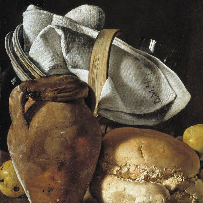 Still life with jug, bread and basket with tableware