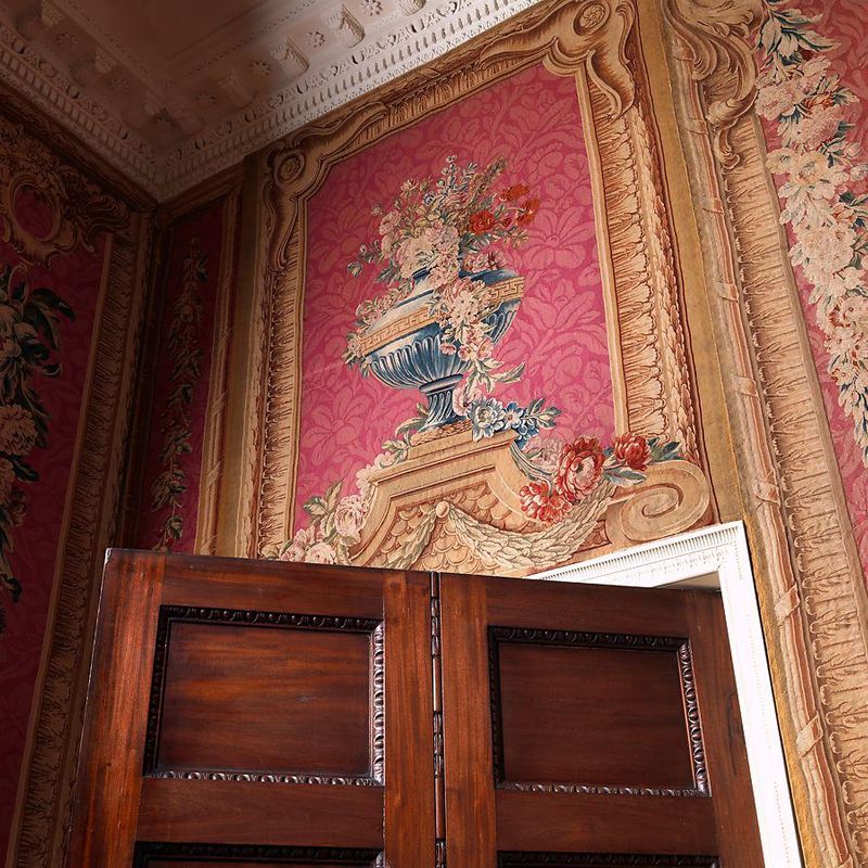 Two overdoor panels with vases
