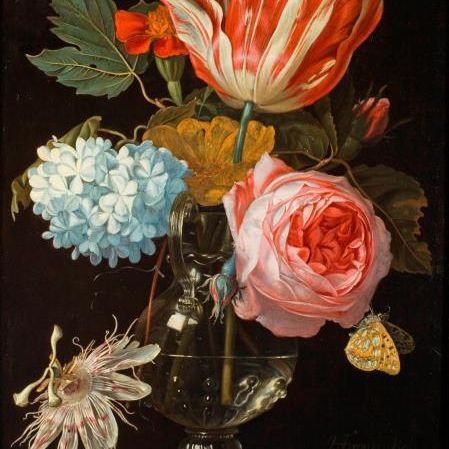 Flowers in a vase with a passion flower
