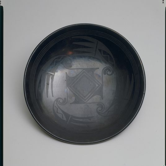 Black-on-black plate, ca.1940