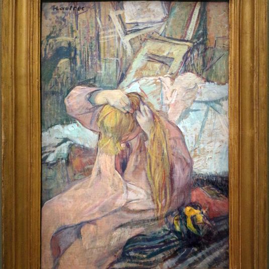 "Femme se coiffant Celle qui se peigne"