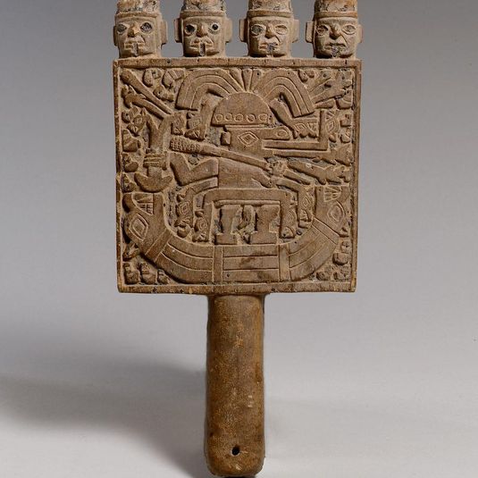 Mirror with figure in a reed boat