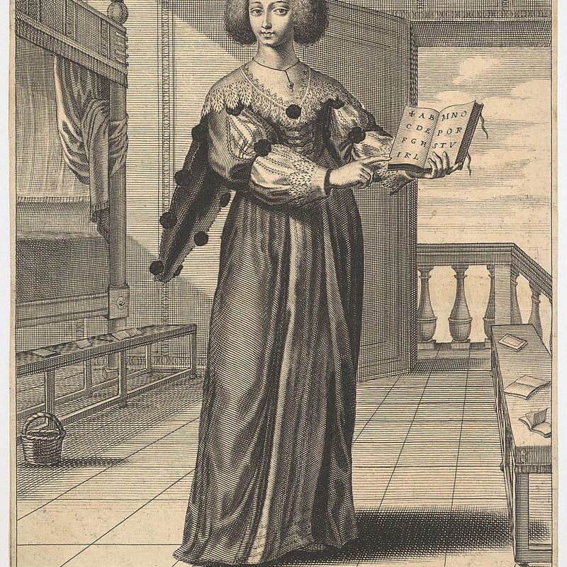 Grammar: a young woman standing in a decorated interior holding an open book in her left hand and pointing to the alphabet inscribed on its pages with her right hand, from the series 'The liberal arts' (Les arts liberaux)