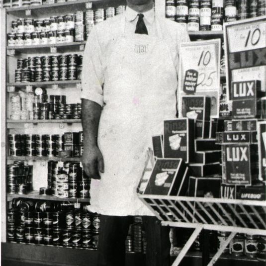Henry Macrini in his store at 1627 Avenue H, Galveston, Texas