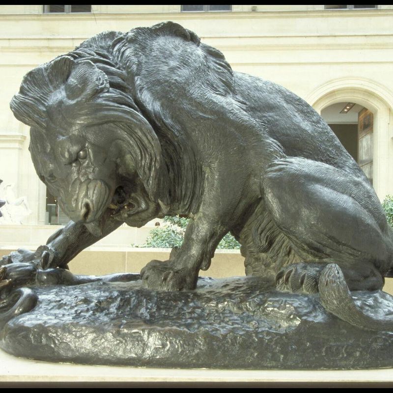 Lion with snake