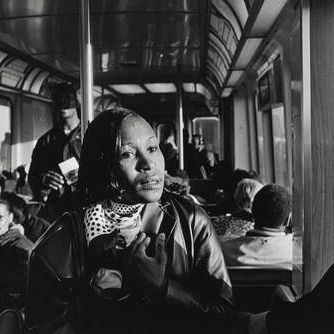 7:00 A.M.: Margie rides the train to her job-training class in downtown Chicago. Accompanying her is Cherilyn, a resident at the Olive Branch who recently found a job as a home-care worker.
