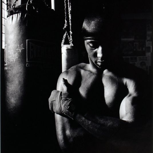 Unidentified boxer with arms crossed