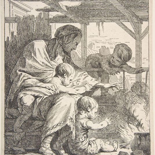 Family Warming Their Hands By a Fire