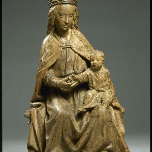 The Virgin and Child seated on a bench
