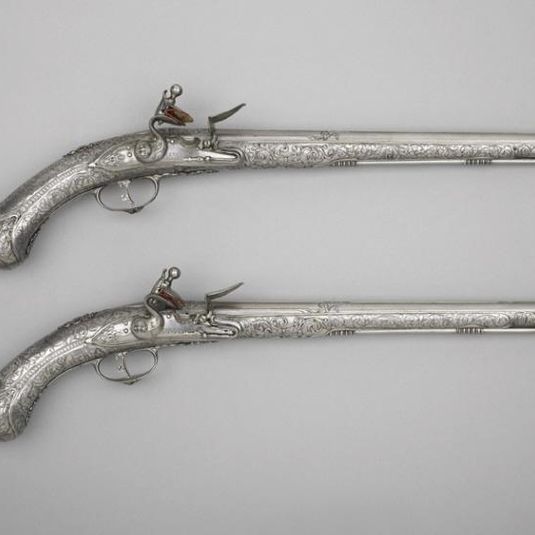 Flint-lock pistol with ramrod