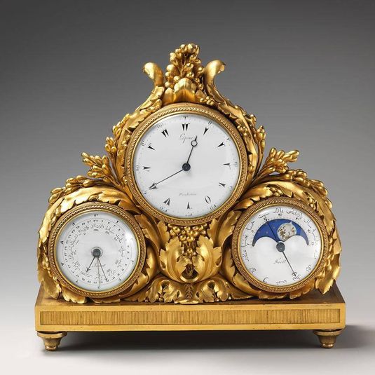Clock with perpetual calendar and moon cycle inscribed in Arabic