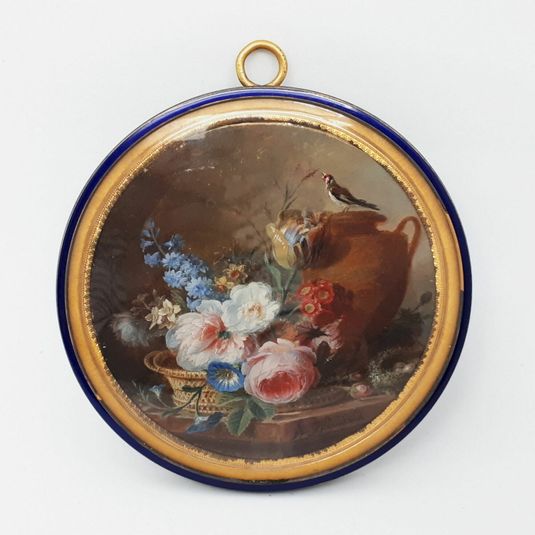 Round miniature with still life: basket of flowers and goldfinch on a vase