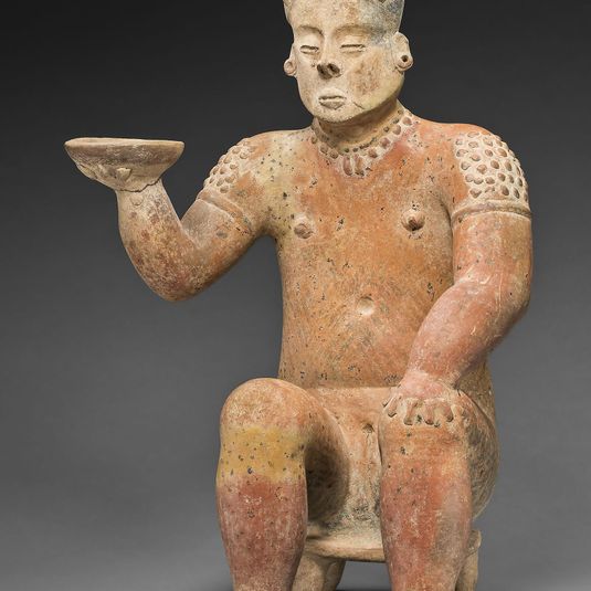 Seated Female Figure Holding a Bowl
