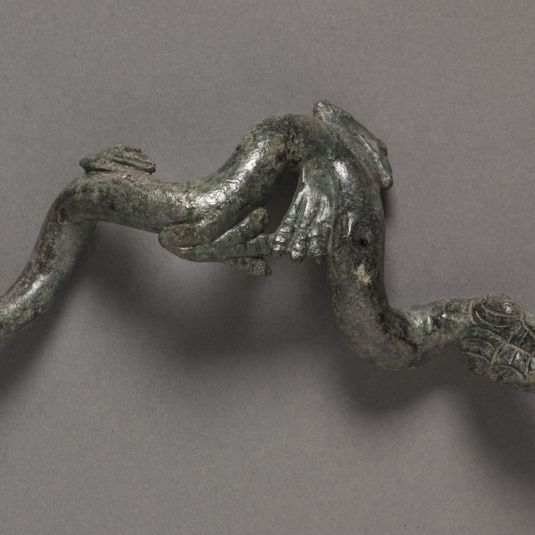 Detached Creature from the Cleveland Apollo: Apollo Sauroktonos (Lizard-Slayer) or Apollo the Python-Slayer