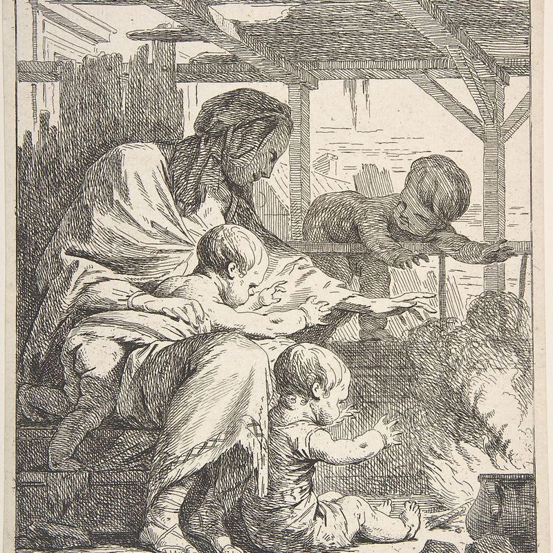 Family Warming Their Hands By a Fire