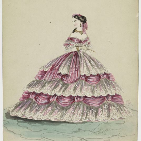 Femme en robe rose et blanc