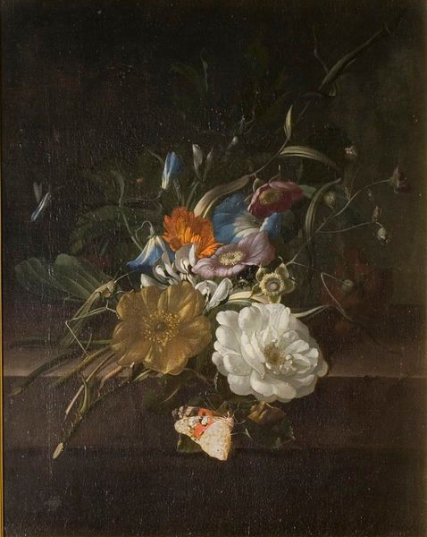 A still-life with a spray of flowers